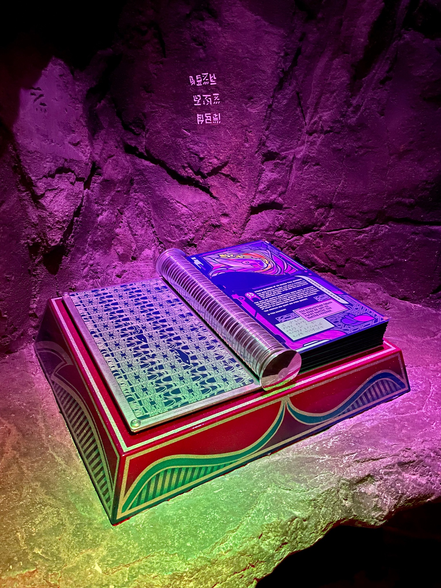 a colorful book in a small cave